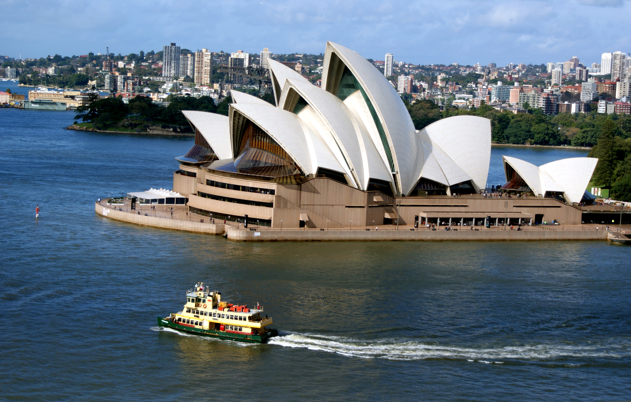 Sydney Opera House and Bridge with boat in water